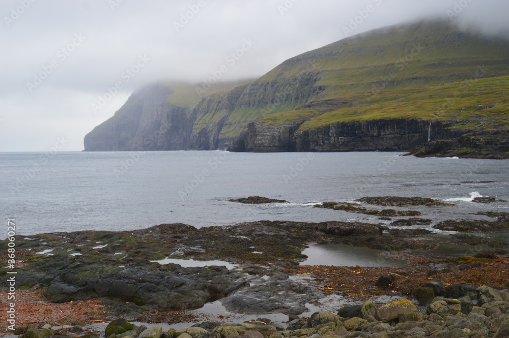 The dramatic coast and mountain landscapes of the Faroe Islands
