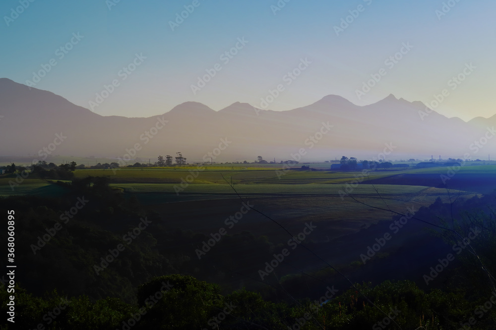 Fototapeta premium farmland and mountain view