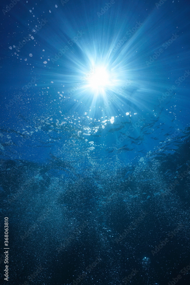 Underwater sunlight with air bubbles rising to water surface, natural scene, Mediterranean sea Underwater sunlight with air bubbles rising to water surface, natural scene, Mediterranean sea