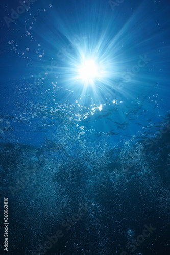 Underwater sunlight with air bubbles rising to water surface, natural scene, Mediterranean sea