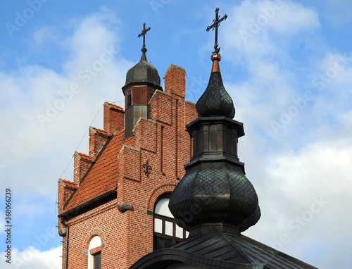 built at the end of the 20th century on the basis of the old fire station, the Greek Catholic church dedicated to Saint Andrew the Apostle in the city of Bartoszyce in Warmia and Masuria in Poland photo