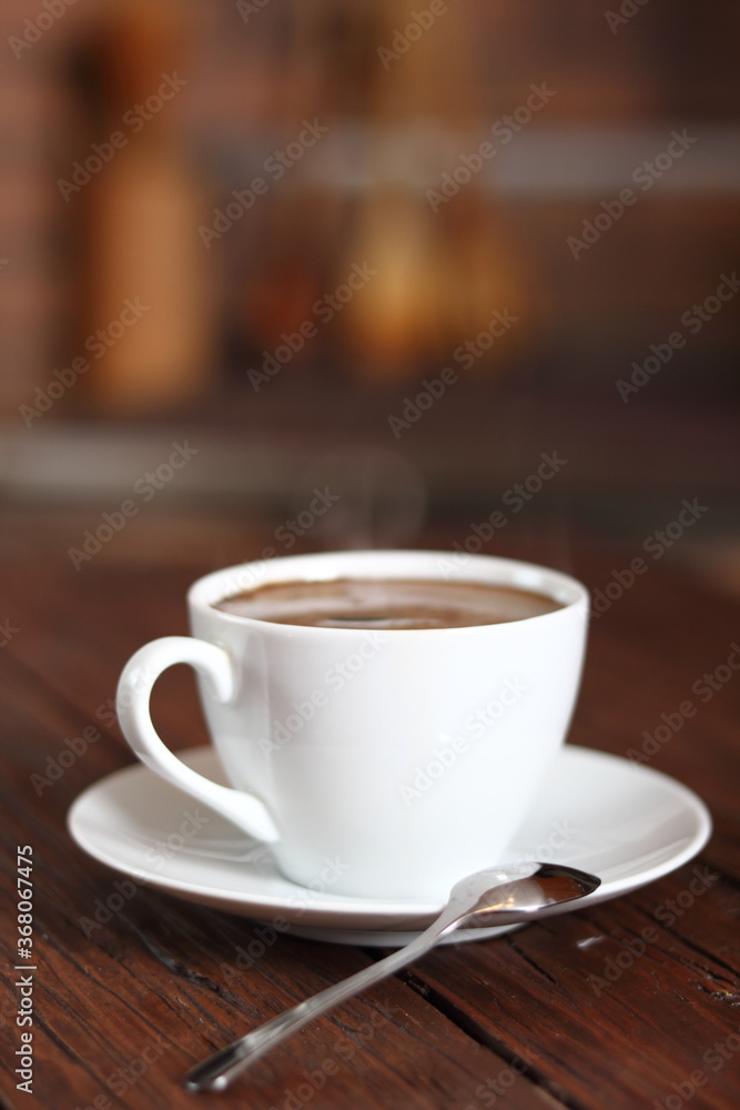Coffee Cup on wooden plank table