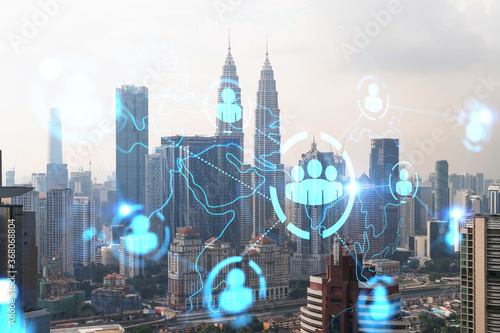 Photography Social media icons hologram over panorama city view of Kuala Lumpur, Malaysia, Asia