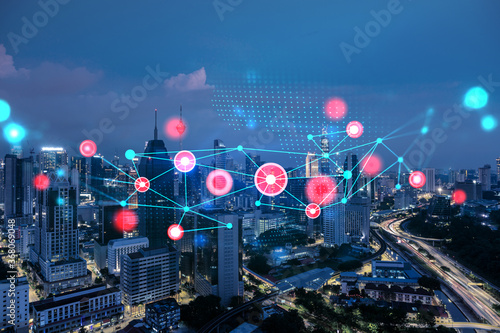 Canvas Print Abstract technology icons, night aerial panoramic cityscape of Kuala Lumpur, Malaysia, Asia