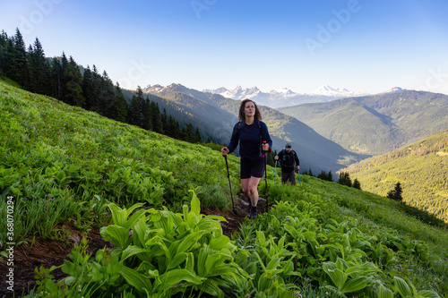 Adventurous Girl and Man Hiking in the Canadian Mountains during a sunny summer morning. Taken on the Trail to Cheam Peak in Chilliwack, East of Vancouver, British Columbia, Canada. © edb3_16