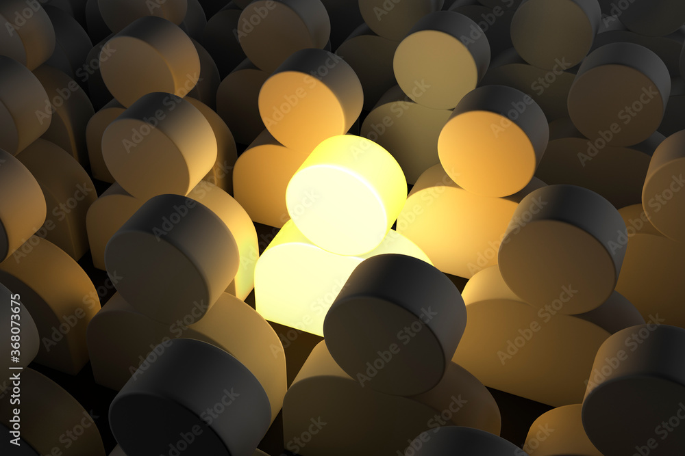 Obraz premium Be Different, One Man Glowing Among Other People in Dark Condition 