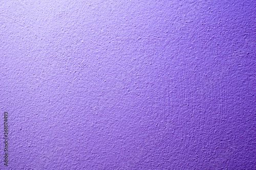 the wall is painted with purple paint with visible details