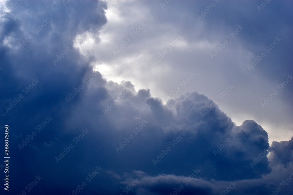 The stormy beauty of the blue Cumulus clouds in summer The stormy beauty of the blue Cumulus clouds in summer