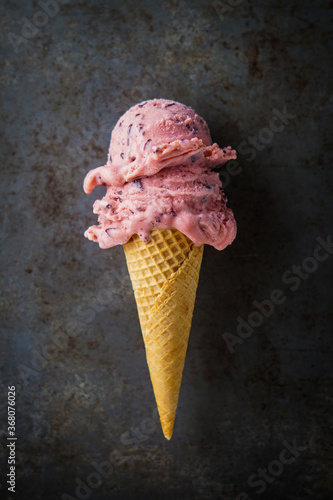 Chocolate raspberry ice cream in a cone