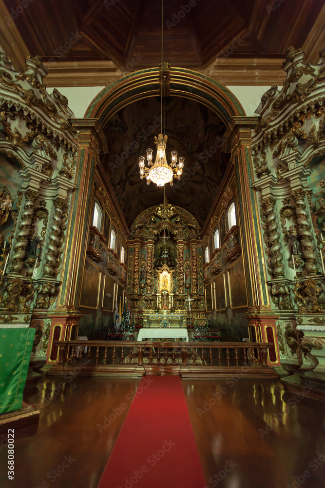 Fototapeta premium ancient church wide-angle view inside with local saints of faith and christian worship golden green and red details