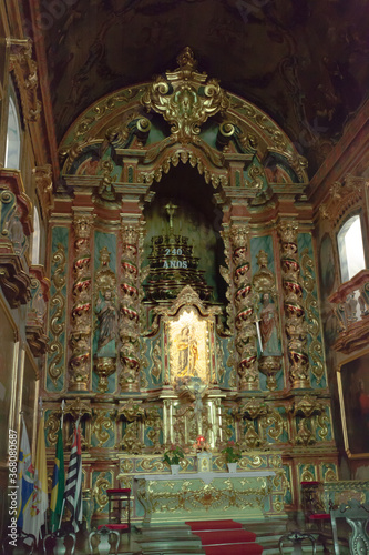  ancient church wide-angle view inside with local saints of faith and christian worship golden green and red details