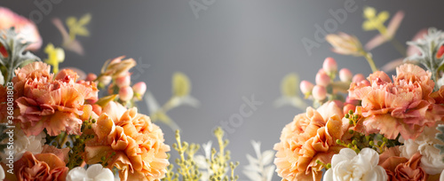 Autumn composition made of beautiful flowers on dark backdrop. Floristic decoration. Natural floral background.