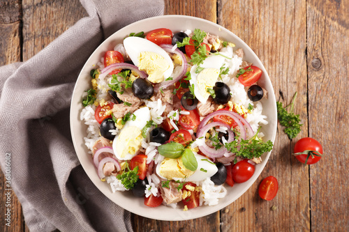 rice salad with egg, tomato, onion, olive