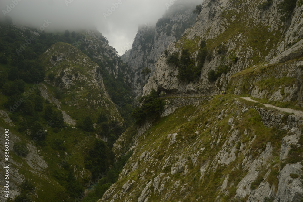 The dramatic landscape of the Picos de Europa mountains in Cantabria and Castile and León in Spain The dramatic landscape of the Picos de Europa mountains in Cantabria and Castile and León in Spain