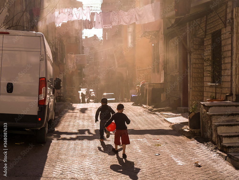 Fototapeta premium Children on the street in the poor neighborhoods of Istanbul