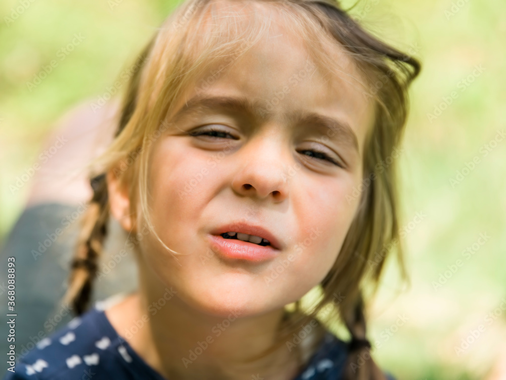 Girl with braided hair looking up Girl with braided hair looking up
