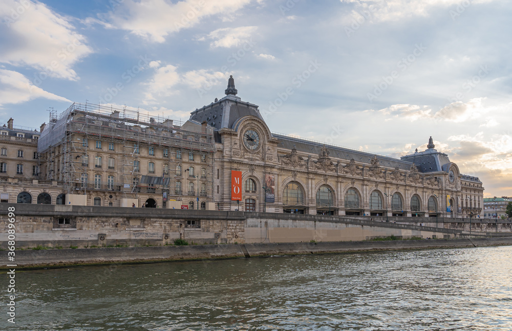 Paris, France - 07 17 2020: View of Orsay Museum from a boat on the Seine
