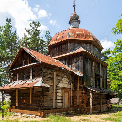 Old antique wooden log building. Former Greek-Catholic church architecture built in year 1755. Wola Wielka village, Poland, Europe.