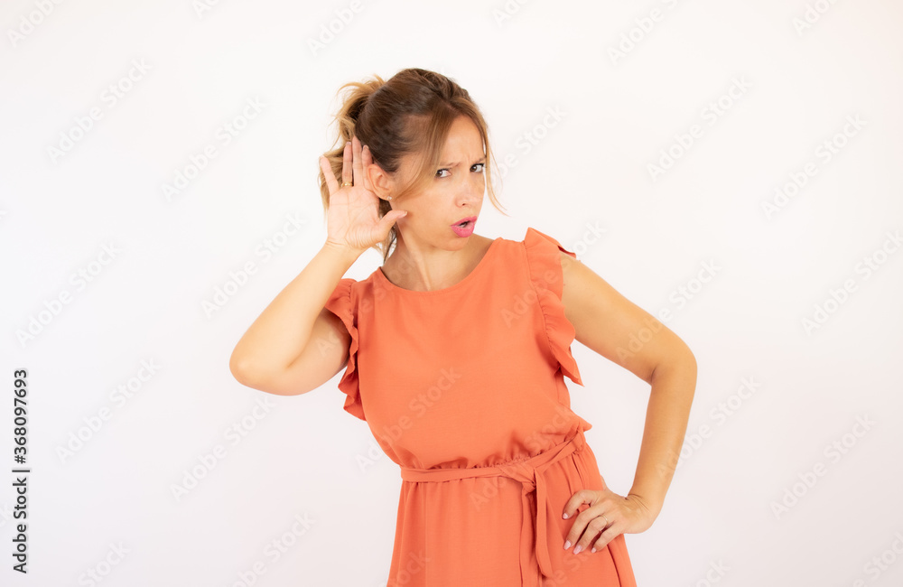Beautiful woman in orange dress on white background Beautiful woman in orange dress on white background
