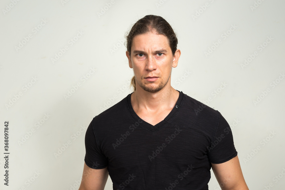 Portrait of handsome bearded man with long hair Portrait of handsome bearded man with long hair
