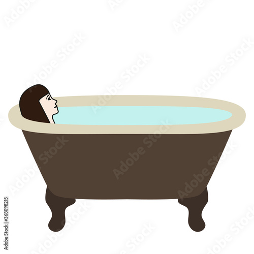 Woman lying in a bath with water