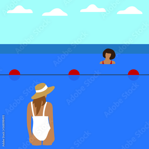 A female character in a swimsuit and hat stands in the water and looks at another female character behind the buoys