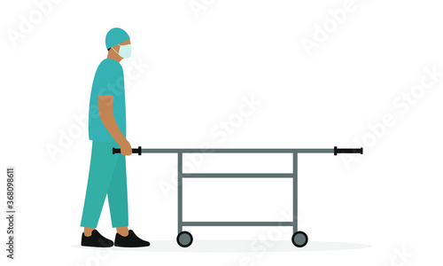 Orderly in uniform and medical mask with a wheeled stretcher on a white background