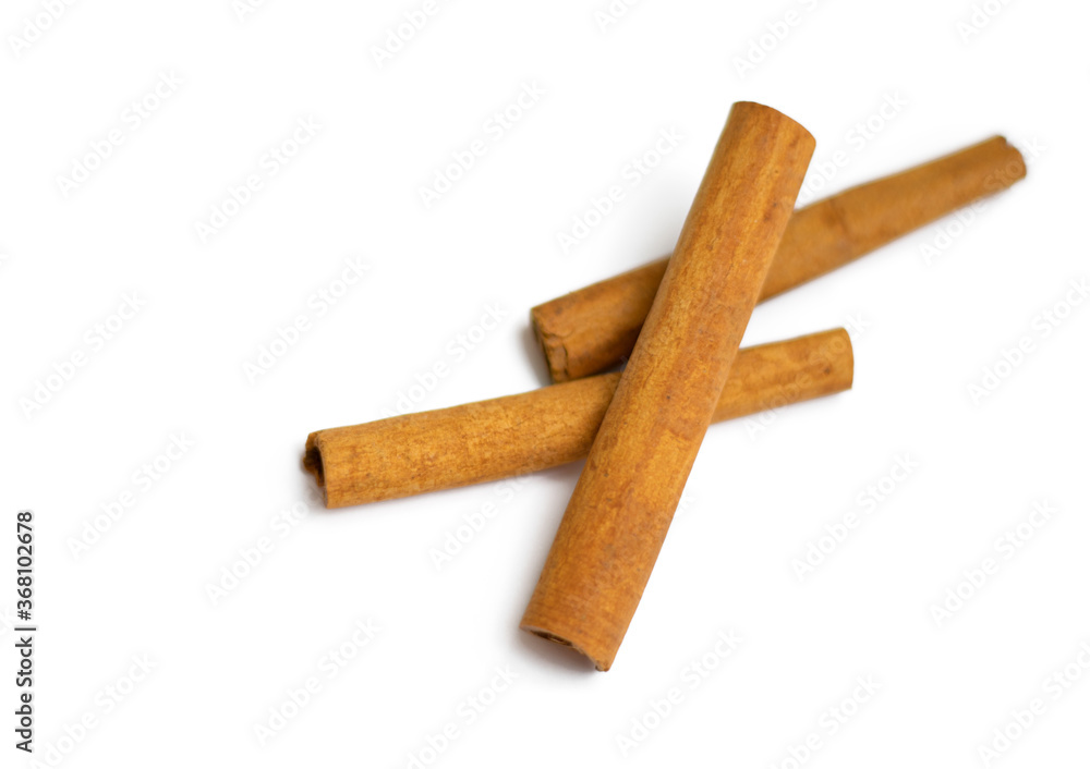 Cinnamon sticks on a white background. Brown, healthy diet. Cinnamon sticks on a white background. Brown, healthy diet.