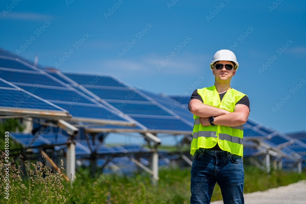 Engineer on a solar plant. Green energy. Electricity. Power energy pannels. Engineer on a solar plant. Green energy. Electricity. Power energy pannels.