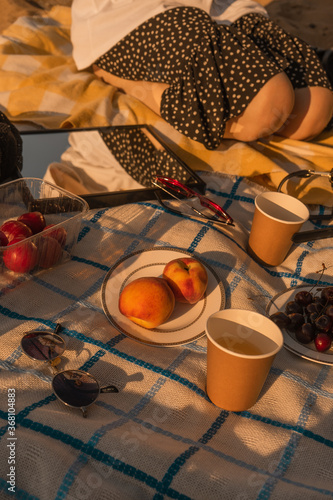picnic with peaches and drinks