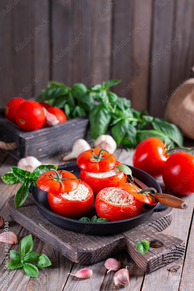 Stuffed tomatoes with cheese and basil Stuffed tomatoes with cheese and basil