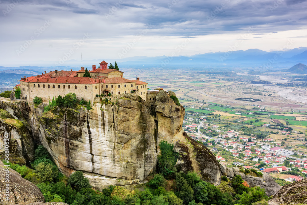 Panoramic view of the mountain formations of Meteora and Monastery of St. Stephen Panoramic view of the mountain formations of Meteora and Monastery of St. Stephen