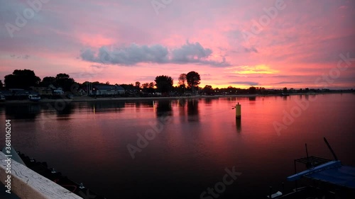 Timelapse of romantic sunset in the bay.