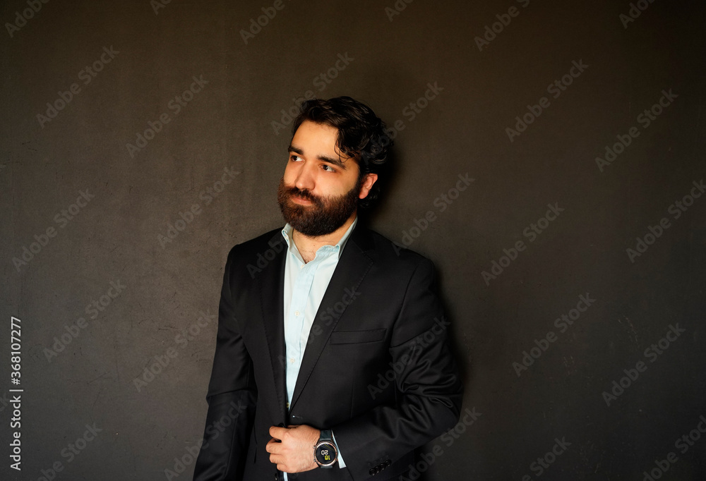bearded businessman looking his right bearded businessman looking his right