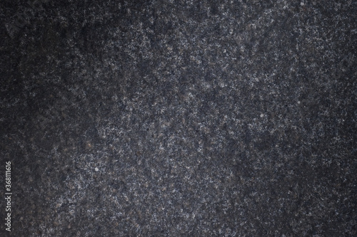 dark gray asphalt. background in focus