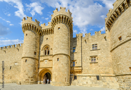 Tourists enter the medieval Palace of the Grand Master of the Knights of Rhodes also known as Kastello on the Mediterranean island of Rhodes Greece