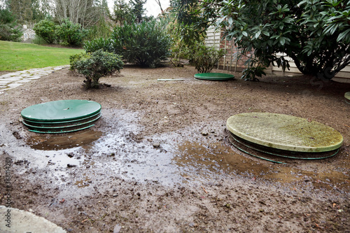 Septic system problems: Leaks around the locking lids of a septic system's tanks & pump chamber photo