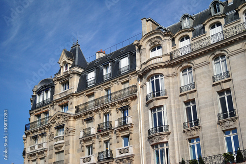 19th Century Parisian Stone Apartment Block seen from Below against Blue Sky © eyepals