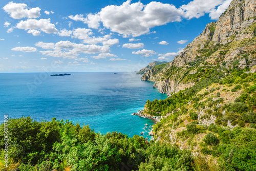 A view from the famous Amalfi Coast drive road towards the cliffs, mountains, coastline, beaches and Mediterranean Sea near Sorrento, Italy