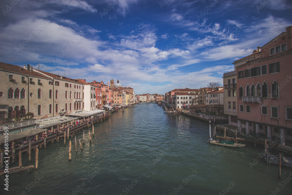 View of canal in Venice and cloudy sky 