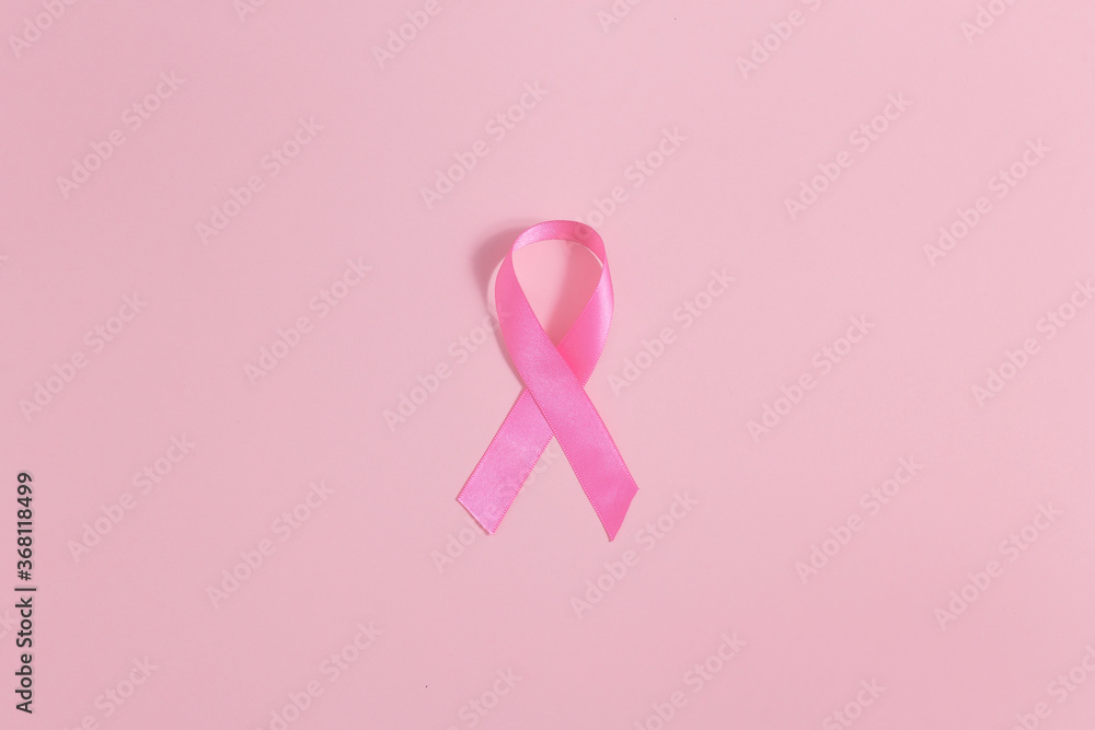 October is Breast Cancer Awareness Month. Pink ribbon to support women with cancer. World Cancer Day concept. October is Breast Cancer Awareness Month. Pink ribbon to support women with cancer. World Cancer Day concept.