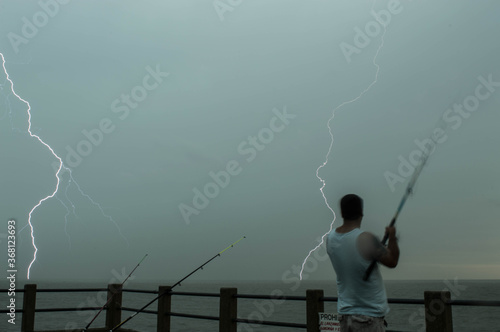 Konstfotografi A stormy day of fishing