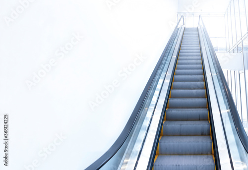 modern escalator view from below. Copy space