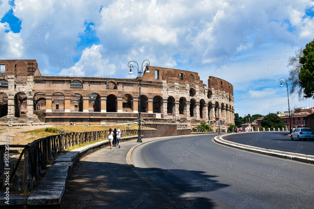View of a street of Rome in front of the Coliseum