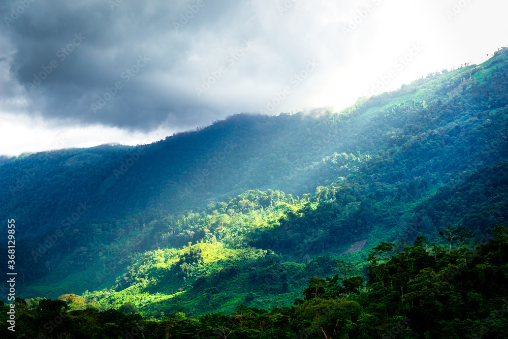 Obraz premium Mountain landscape with clouds