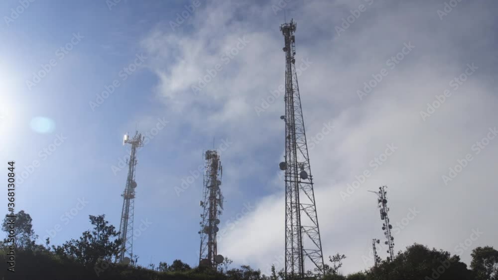 Time lapse of clouds passing high antennas Time lapse of clouds passing high antennas