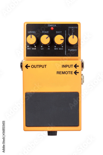 Stomp box electric guitar signal distortion orange effects foot pedal isolated on white background with clipping path. photo