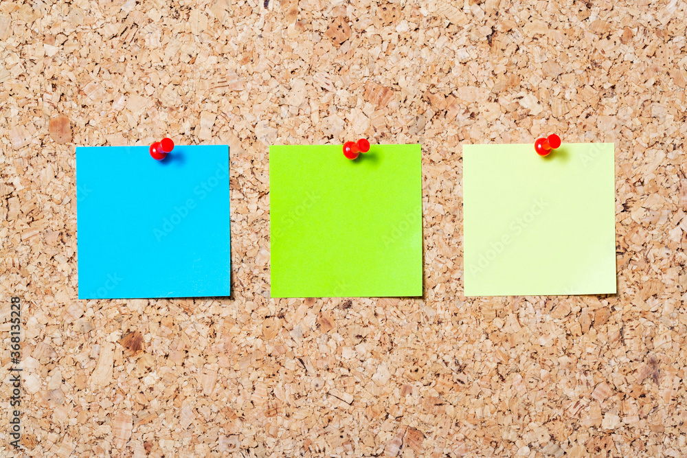 Sticky note on cork board
Sticky note on cork board