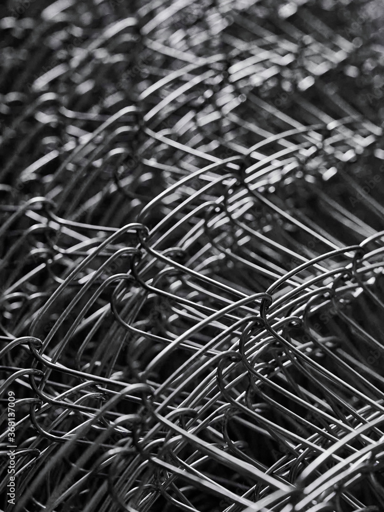 Metal grid. Multi-layer mesh. Construction Materials. Mesh netting. Selective focus Metal grid. Multi-layer mesh. Construction Materials. Mesh netting. Selective focus