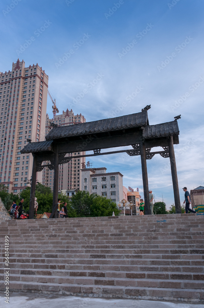 China, Heihe, July 2019: Chinese-style Gate on the Heihe city waterfront in summer